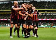 29 July 2021; Rob Cornwall of Bohemians celebrates with team-mates Georgie Kelly, left, and Ciarán Kelly, right after scoring his side's first during the UEFA Europa Conference League second qualifying round second leg match between Bohemians and F91 Dudelange at Aviva Stadium in Dublin. Photo by Eóin Noonan/Sportsfile