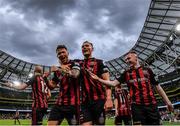 29 July 2021; Rob Cornwall of Bohemians, left, celebrates with team-mates Ciarán Kelly, centre, and Ross Tierney, right after scoring his side's first goal during the UEFA Europa Conference League second qualifying round second leg match between Bohemians and F91 Dudelange at Aviva Stadium in Dublin. Photo by Eóin Noonan/Sportsfile