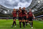 29 July 2021; Rob Cornwall of Bohemians, centre, celebrates with team-mates, from left, Georgie Kelly, Ciarán Kelly and Ross Tierney after scoring his side's first goal during the UEFA Europa Conference League second qualifying round second leg match between Bohemians and F91 Dudelange at Aviva Stadium in Dublin. Photo by Eóin Noonan/Sportsfile