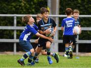 30 July 2021; Casey Reynolds, age 8, in action during the Bank of Ireland Leinster Rugby Summer Camp at Navan RFC in Navan, Meath. Photo by Matt Browne/Sportsfile