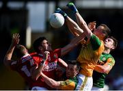 25 July 2021; Kerry goalkeeper Shane Ryan punches the ball clear, supported by team-mates Paul Murphy, left, and David Moran, and ahead of Cork players Brian Hurley, far left, and Ian Maguire during the Munster GAA Football Senior Championship Final match between Kerry and Cork at Fitzgerald Stadium in Killarney, Kerry. Photo by Piaras Ó Mídheach/Sportsfile