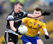 6 August 2021; Stephen Rogan of Sligo in action against James Brady of Roscommon during the Electric Ireland Connacht GAA Minor 2021 Final match between Roscommon and Sligo at Dr Hyde Park in Roscommon. Photo by Piaras Ó Mídheach/Sportsfile