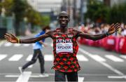 8 August 2021; Eliud Kipchoge of Kenya celebrates after winning the men's marathon at Sapporo Odori Park on day 16 during the 2020 Tokyo Summer Olympic Games in Sapporo, Japan. Photo by Ramsey Cardy/Sportsfile