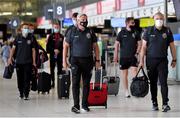 10 August 2021; Bohemians manager Keith Long, centre, with assistant manager Trevor Croly, right, at Dublin Airport prior to their side's departure to Greece for their UEFA Europa Conference League third qualifying round second leg match against PAOK. Photo by Seb Daly/Sportsfile