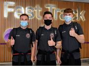10 August 2021; Bohemians players, from left, Liam Burt, Ali Coote and Stephen Mallon at Dublin Airport prior to their side's departure to Greece for their UEFA Europa Conference League third qualifying round second leg match against PAOK. Photo by Seb Daly/Sportsfile