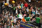 10 August 2021; Supporters cheer on as Team Ireland women's lightweight gold medallist Kellie Harrington and Emmet Brennan pass through Portland Row in Dublin on their return from the Tokyo 2020 Summer Olympic Games. Photo by David Fitzgerald/Sportsfile