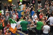 10 August 2021; Supporters cheer on as Team Ireland women's lightweight gold medallist Kellie Harrington and Emmet Brennan pass through Portland Row in Dublin on their return from the Tokyo 2020 Summer Olympic Games. Photo by David Fitzgerald/Sportsfile