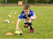 12 August 2021; Sean Keightley, age 10, scores a try during the Bank of Ireland Leinster Rugby Summer Inclusion Camp at Newbridge RFC in Newbridge, Kildare. Photo by Matt Browne/Sportsfile