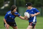 13 August 2021; Tiziano Spina, age 10, and Katie Conroy, age 12, in action during the Bank of Ireland Leinster Rugby Summer Camp at Tallaght RFC in Dublin. Photo by Seb Daly/Sportsfile