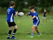 13 August 2021; Harry Cooke, age 10, right, in action during the Bank of Ireland Leinster Rugby Summer Camp at Tallaght RFC in Dublin. Photo by Seb Daly/Sportsfile
