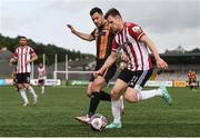 15 August 2021; Cameron McJannet of Derry City in action against Patrick Hoban of Dundalk during the SSE Airtricity League Premier Division match between Derry City and Dundalk at Ryan McBride Brandywell Stadium in Derry. Photo by Ben McShane/Sportsfile