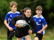 17 August 2021; Abigail Kerin, age 10, in action during the Bank of Ireland Leinster Rugby Summer Camp at Dundalk RFC in Dundalk. Photo by Matt Browne/Sportsfile