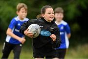 17 August 2021; Abigail Kerin, age 10, in action during the Bank of Ireland Leinster Rugby Summer Camp at Dundalk RFC in Dundalk. Photo by Matt Browne/Sportsfile