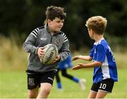 17 August 2021; Peter Devlin, age 8, in action during the Bank of Ireland Leinster Rugby Summer Camp at Dundalk RFC in Dundalk. Photo by Matt Browne/Sportsfile