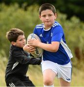 17 August 2021; John Carolan, age 9, in action during the Bank of Ireland Leinster Rugby Summer Camp at Dundalk RFC in Dundalk. Photo by Matt Browne/Sportsfile