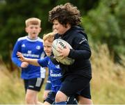 17 August 2021; Cooper Murray, age 8, in action during the Bank of Ireland Leinster Rugby Summer Camp at Dundalk RFC in Dundalk. Photo by Matt Browne/Sportsfile
