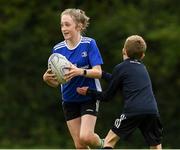 17 August 2021; Meadhbh O'Neill, age 12, in action during the Bank of Ireland Leinster Rugby Summer Camp at Dundalk RFC in Dundalk. Photo by Matt Browne/Sportsfile