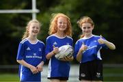 18 August 2021; Participants, from left, Esme Ryan, age 11, Laela Ryan, age 9, and Lorna King, age 10, during the Bank of Ireland Leinster Rugby Summer Camp at DLSP RFC in Kilternan, Dublin. Photo by Matt Browne/Sportsfile