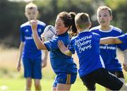 24 August 2021; Avie O'Connor, age 11, in action during the Bank of Ireland Leinster Rugby Summer Camp at Cill Dara RFC in Kildare. Photo by Matt Browne/Sportsfile