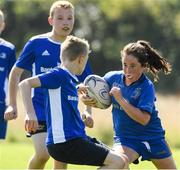 24 August 2021; Avie O'Connor, age 11, in action during the Bank of Ireland Leinster Rugby Summer Camp at Cill Dara RFC in Kildare. Photo by Matt Browne/Sportsfile