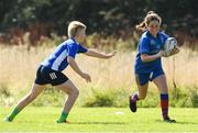 24 August 2021; Avie O'Connor, age 11, in action during the Bank of Ireland Leinster Rugby Summer Camp at Cill Dara RFC in Kildare. Photo by Matt Browne/Sportsfile