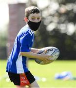 24 August 2021; Jamie Monahan, age 10, in action during the Bank of Ireland Leinster Rugby Summer Camp at Cill Dara RFC in Kildare. Photo by Matt Browne/Sportsfile