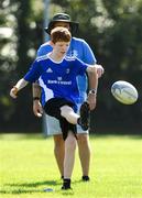 24 August 2021; Ethan Coghlan, age 11, in action during the Bank of Ireland Leinster Rugby Summer Camp at Cill Dara RFC in Kildare. Photo by Matt Browne/Sportsfile