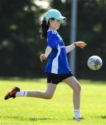 24 August 2021; Roisin Gleeson, age 10, in action during the Bank of Ireland Leinster Rugby Summer Camp at Cill Dara RFC in Kildare. Photo by Matt Browne/Sportsfile