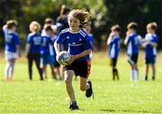 24 August 2021; Donnacha Finn, age 10, in action during the Bank of Ireland Leinster Rugby Summer Camp at Cill Dara RFC in Kildare. Photo by Matt Browne/Sportsfile