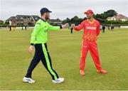 29 August 2021; Team captains Andrew Balbirnie of Ireland, left, and Craig Ervine of Zimbabwe before match two of the Dafanews T20 series between Ireland and Zimbabwe at Clontarf Cricket Club in Dublin. Photo by Seb Daly/Sportsfile