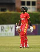 29 August 2021; Wessley Madhevere of Zimbabwe departs after being caught by Ireland wicketkeeper Neil Rock during match two of the Dafanews T20 series between Ireland and Zimbabwe at Clontarf Cricket Club in Dublin. Photo by Seb Daly/Sportsfile