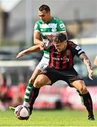 29 August 2021; Rob Cornwall of Bohemians in action against Graham Burke of Shamrock Rovers during the extra.ie FAI Cup second round match between Bohemians and Shamrock Rovers at Dalymount Park in Dublin. Photo by Eóin Noonan/Sportsfile