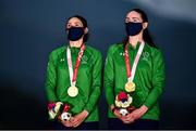 31 August 2021; Eve McCrystal, right, and Katie George Dunlevy of Ireland, during the playing of the Ireland national anthem after winning gold in the Women's B Time Trial at the Fuji International Speedway on day seven during the Tokyo 2020 Paralympic Games in Shizuoka, Japan. Photo by David Fitzgerald/Sportsfile