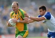 21 July 2013; Colm McFadden, Donegal, in action against Drew Wylie, Monaghan. Ulster GAA Football Senior Championship Final, Donegal v Monaghan, St Tiernach's Park, Clones, Co. Monaghan. Picture credit: Brian Lawless / SPORTSFILE
