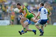 21 July 2013; Michael Murphy, Donegal, in action against Vincent Corey and Gavin Doogan, left, Monaghan. Ulster GAA Football Senior Championship Final, Donegal v Monaghan, St Tiernach's Park, Clones, Co. Monaghan. Picture credit: Brian Lawless / SPORTSFILE