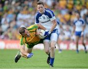 21 July 2013; Conor McManus, Monaghan, in action against Neil McGee, Donegal. Ulster GAA Football Senior Championship Final, Donegal v Monaghan, St Tiernach's Park, Clones, Co. Monaghan. Picture credit: Brian Lawless / SPORTSFILE