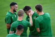 31 August 2021; Aaron Connolly has his ear flicked by team-mates Troy Parrott, left, Daryl Horgan and Jayson Molumby, right, during a Republic of Ireland training session at Estádio Algarve in Faro, Portugal. Photo by Stephen McCarthy/Sportsfile