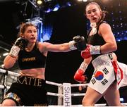 4 September 2021; Katie Taylor, left, and Jennifer Han during their Undisputed Female Lightweight Championship bout at Emerald Headingley Stadium in Leeds, England. Photo by Mark Robinson / Matchroom Boxing via Sportsfile