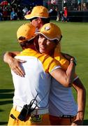 5 September 2021; Mel Reid of Team Europe, right, and Team Captain Catriona Matthews embrace after finishing her match on the 18th green during the afternoon fourballs on day two of the Solheim Cup at the Inverness Club in Toledo, Ohio, USA. Photo by Brian Spurlock/Sportsfile