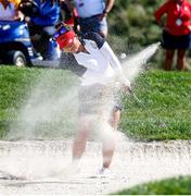 5 September 2021; Megan Khang of Team USA plays out of a bunker on the 13th green during the afternoon fourballs on day two of the Solheim Cup at the Inverness Club in Toledo, Ohio, USA. Photo by Brian Spurlock/Sportsfile