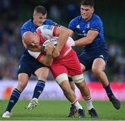 10 September 2021; Tom Lawday of Harlequins is tackled by Jonathan Sexton, left, and Dan Sheehan of Leinster during the Bank of Ireland Pre-Season Friendly match between Leinster and Harlequins at Aviva Stadium in Dublin. Photo by Brendan Moran/Sportsfile