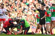 11 September 2021; Referee Joe McQuillan rewards a free to Mayo as Pádraig O'Hora of Mayo receives medical attention during the GAA Football All-Ireland Senior Championship Final match between Mayo and Tyrone at Croke Park in Dublin. Photo by Brendan Moran/Sportsfile