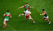 11 September 2021; Brian Kennedy of Tyrone in action against Mayo players, left to right, Pádraig O'Hora, Kevin McLoughlin, and Tommy Conroy the GAA Football All-Ireland Senior Championship Final match between Mayo and Tyrone at Croke Park in Dublin. Photo by Daire Brennan/Sportsfile