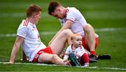 11 September 2021; Conor Meyler and Peter Harte of Tyrone with ten month old Ava Harte  after the GAA Football All-Ireland Senior Championship Final match between Mayo and Tyrone at Croke Park in Dublin. Photo by Ray McManus/Sportsfile