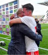 11 September 2021; Darragh Canavan of Tyrone celebrates with his father, former Tyrone captain and Sky Sports GAA pundit Peter Canavan, after the GAA Football All-Ireland Senior Championship Final match between Mayo and Tyrone at Croke Park in Dublin. Photo by Brendan Moran/Sportsfile