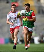 11 September 2021; Tommy Conroy of Mayo in action against Peter Harte of Tyrone during the GAA Football All-Ireland Senior Championship Final match between Mayo and Tyrone at Croke Park in Dublin. Photo by David Fitzgerald/Sportsfile