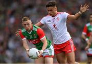 11 September 2021; Ryan O'Donoghue of Mayo in action against Michael McKernan of Tyrone during the GAA Football All-Ireland Senior Championship Final match between Mayo and Tyrone at Croke Park in Dublin. Photo by Ramsey Cardy/Sportsfile