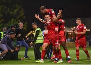 24 September 2021; Michael O'Connor of Shelbourne celebrates after scoring his side's second goal supporters and team-mates during the SSE Airtricity League First Division match between Cabinteely and Shelbourne at Stradbrook in Blackrock, Dublin. Photo by David Fitzgerald/Sportsfile