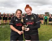 25 September 2021; Longford RFC captain Hannah Shea presents the player of the match to team-mate Leanne Keegan after the Bank of Ireland Paul Cusack plate final match between Greystones and Longford at Tullow RFC in Carlow. Photo by Michael P Ryan/Sportsfile