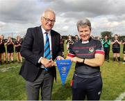 25 September 2021; Leinster Rugby women's section chairperson Eugene Noble presents a pennant to Longford RFC coach Nuala McGoey during the Bank of Ireland Paul Cusack plate final match between Greystones and Longford at Tullow RFC in Carlow. Photo by Michael P Ryan/Sportsfile